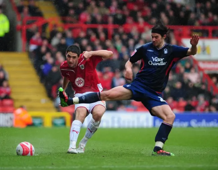Framed Print : Bradley Orr vs. George Boyd: Intense Battle in the Championship Clash between Bristol City and Nottingham Forest - 03 / 04 / 2010