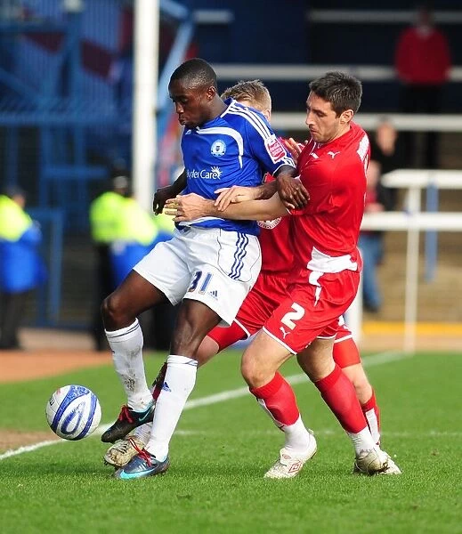 Bradley Orr vs. Nathan Koranteng: Intense Battle for the Ball in Peterborough v Bristol City Championship Match, 2010