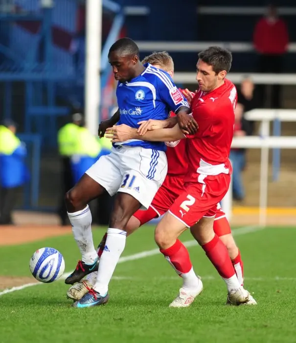 Framed Print : Bradley Orr vs. Nathan Koranteng: Intense Battle for the Ball in Peterborough v Bristol City Championship Match, 2010 Framed Print : Bradley Orr vs. Nathan Koranteng: Intense Battle for the Ball in Peterborough v Bristol City Championship Match, 2010