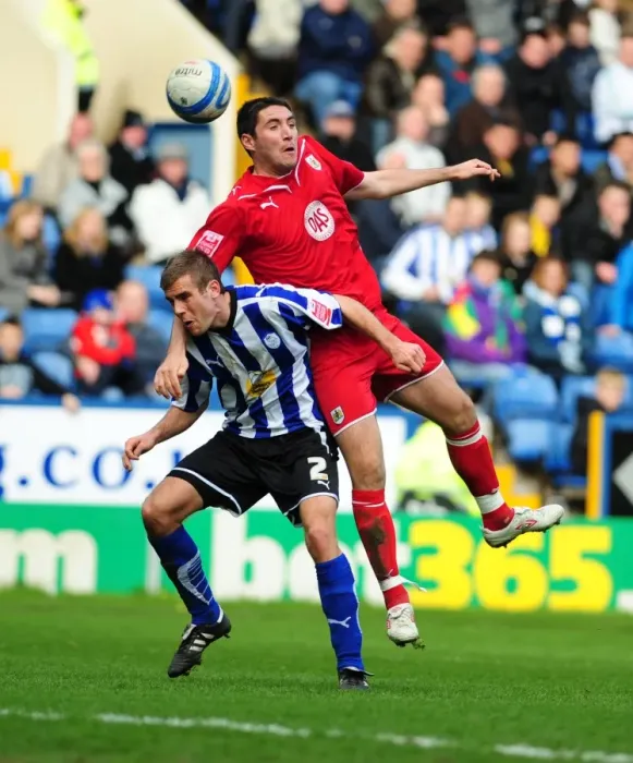 Framed Print : Bradley Orr vs. Tommy Spurr: Aerial Battle in the Championship Clash between Sheffield Wednesday and Bristol City (16th March 2010)