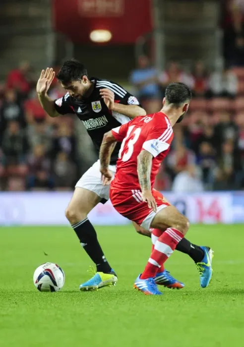 Framed Print : Brendan Moloney vs. Danny Fox: Intense Moment at St. Mary's Stadium - Southampton vs. Bristol City, 2013