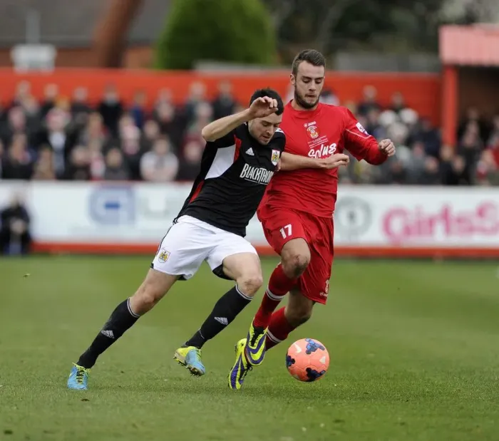 Framed Print : Brendan Moloney vs. Richard Peniket: A Football Rivalry at The Lamb Ground, Tamworth (FA Cup, 2013) Framed Print : Brendan Moloney vs. Richard Peniket: A Football Rivalry at The Lamb Ground, Tamworth (FA Cup, 2013)