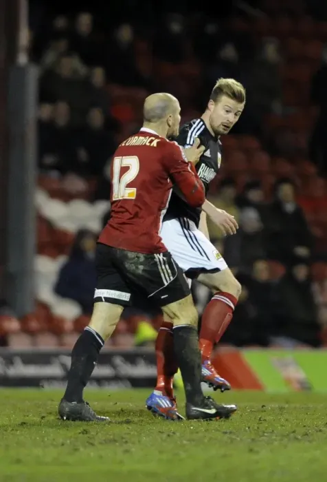 Framed Print : Brentford vs. Bristol City: Intense Moment Between Alan McCormack and Wade Elliott Framed Print : Brentford vs. Bristol City: Intense Moment Between Alan McCormack and Wade Elliott