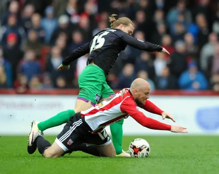 Framed Print : Brentford vs. Bristol City: Luke Freeman Fouls Alan McCormack Framed Print : Brentford vs. Bristol City: Luke Freeman Fouls Alan McCormack
