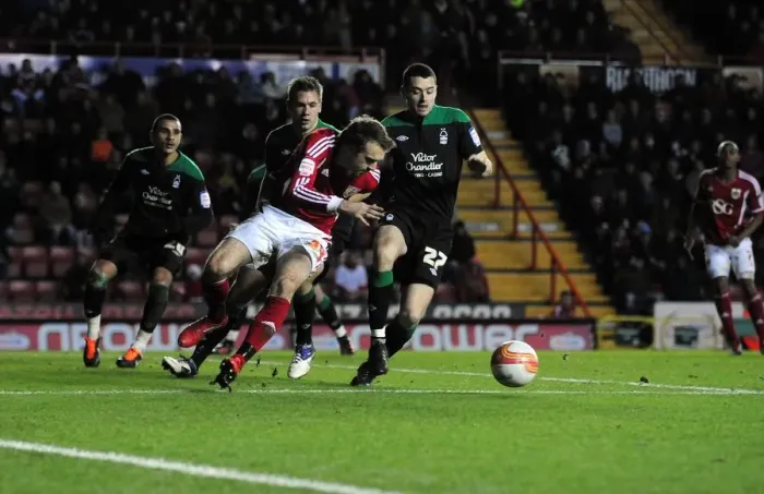 Framed Print : Brett Pitman of Bristol City Holds Ball in Championship Match vs. Nottingham Forest (December 17, 2011)