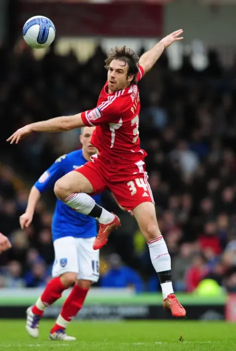 Framed Print : Brett Pitman Soars High: A Riveting Moment from the Portsmouth vs. Bristol City Football Rivalry (17-03-2012) Framed Print : Brett Pitman Soars High: A Riveting Moment from the Portsmouth vs. Bristol City Football Rivalry (17-03-2012)
