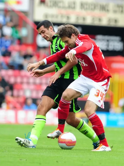 Framed Print : Brett Pitman vs. Marcos Painter: Intense Battle in the Championship Match between Bristol City and Brighton (September 10, 2011) Framed Print : Brett Pitman vs. Marcos Painter: Intense Battle in the Championship Match between Bristol City and Brighton (September 10, 2011)