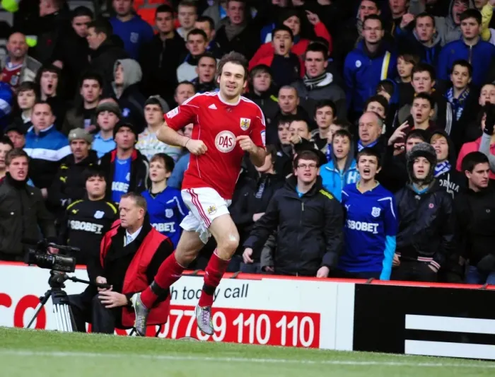 Framed Print : Brett Pitman's Euphoric Moment: Championship Clash between Bristol City and Cardiff City at Ashton Gate Stadium (01.01.2011)