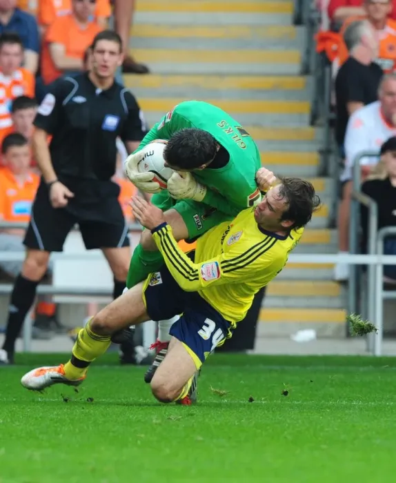 Framed Print : Brett Pitman's Forceful Challenge on Matthew Gilks during Blackpool vs. Bristol City League Cup Match, October 1st, 2011