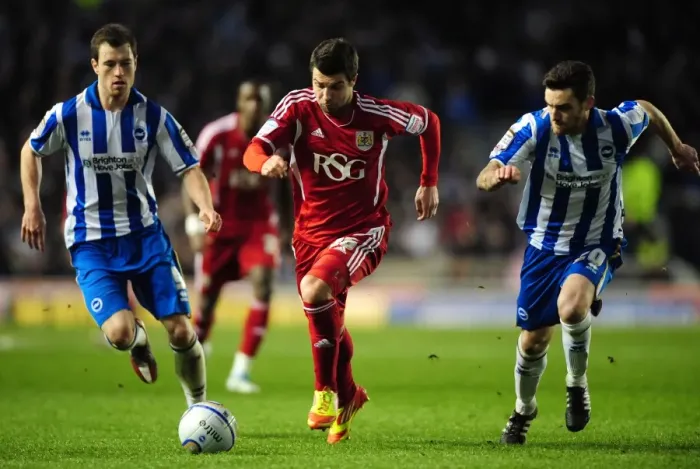 Framed Print : Brighton vs. Bristol City: Richard Foster Beats the Defence in Championship Clash - 14 / 01 / 2012