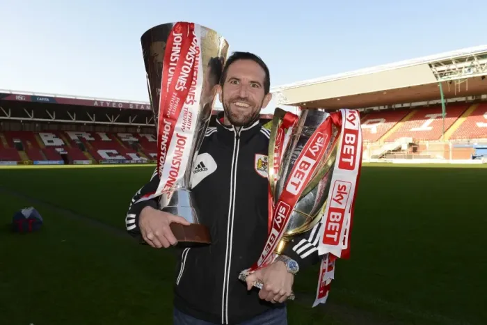 Framed Print : Bristol City Academy: Dougie Allward Captures Champions with Johnstone Paint Trophy and Sky Bet League One Trophies