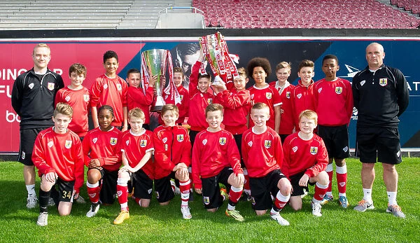 Bristol City Academy Celebrates Double Victory with Johnstones Paint and Sky Bet League One Trophies
