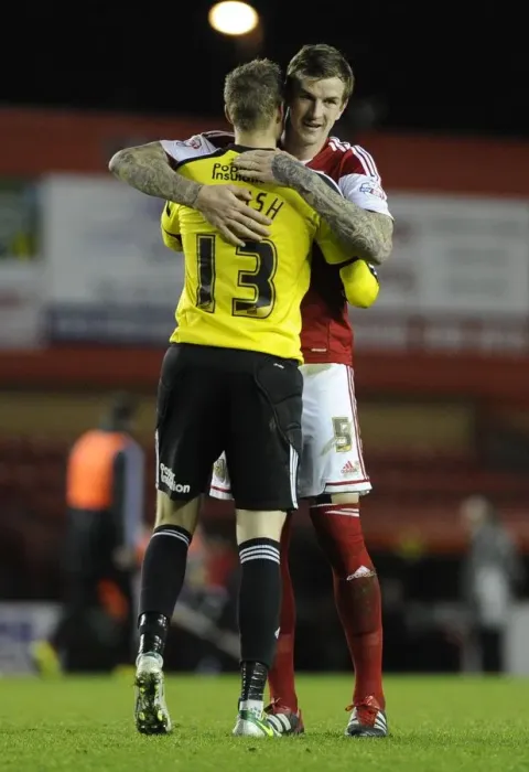 Framed Print : Bristol City: Aden Flint and Elliott Parish Embrace Victory After FA Cup Match vs Dagenham and Redbridge Framed Print : Bristol City: Aden Flint and Elliott Parish Embrace Victory After FA Cup Match vs Dagenham and Redbridge