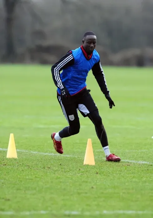Framed Print : Bristol City: Albert Adomah in Intense Training Focus