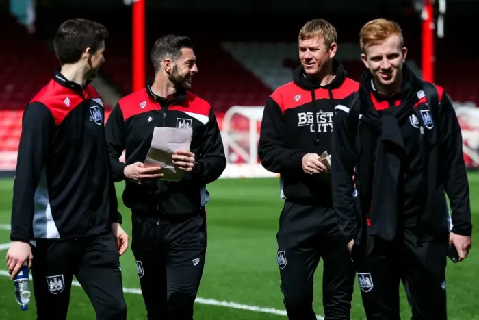 Framed Print : Bristol City Assistants McCalister and Holden Share a Laugh at Griffin Park Framed Print : Bristol City Assistants McCalister and Holden Share a Laugh at Griffin Park