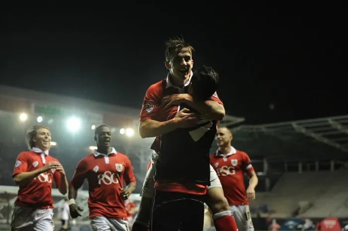 Framed Print : Bristol City: Bryan and Cunningham Celebrate Goal Against Swindon Town, April 2015 Framed Print : Bristol City: Bryan and Cunningham Celebrate Goal Against Swindon Town, April 2015