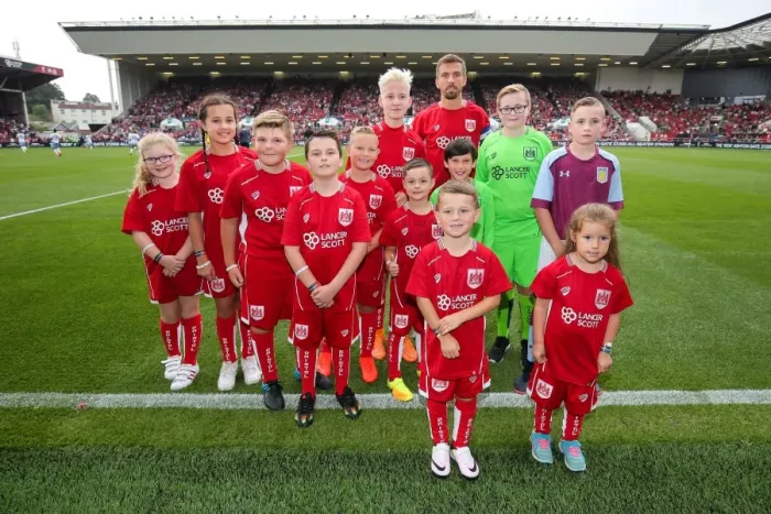 Framed Print : Bristol City Captain Gary O'Neil with Mascots at Ashton Gate Stadium during Bristol City vs Aston Villa, Sky Bet EFL Championship Match