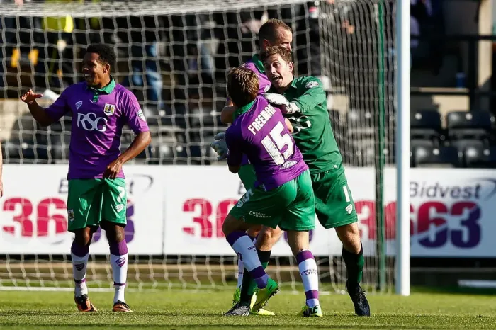 Framed Print : Bristol City Celebrate 1-2 Win Over Notts County: Luke Freeman and Frank Fielding Rejoice at Final Whistle