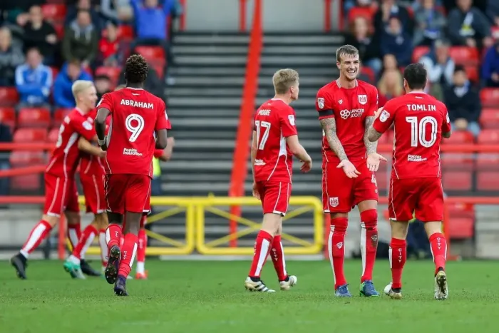 Framed Print : Bristol City Celebrate First Goal Against Blackburn Rovers: Aden Flint, Lee Tomlin, and Aaron Wilbraham Rejoice after Wilbraham's Score (1-0) - Sky Bet EFL Championship, Ashton Gate Stadium, Bristol, England (2016)