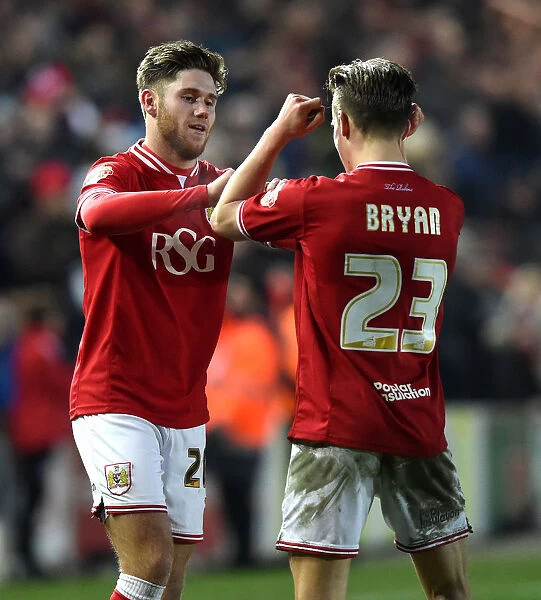 Bristol City Celebrate Win Against Middlesbrough: Wes Burns and Joe Bryan Rejoice on Pitch