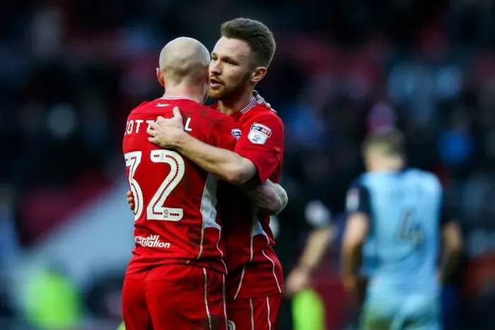 Framed Print : Bristol City Celebrates 1-0 Win: New Signings Cotterill and Taylor Embrace Framed Print : Bristol City Celebrates 1-0 Win: New Signings Cotterill and Taylor Embrace