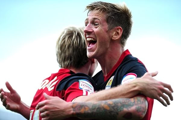 Bristol City Celebrates Championship Goal: John Stead and Martyn Woolford Rejoice After Score Against Cardiff City