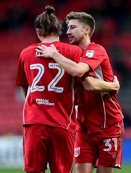 Bristol City Celebrates Championship Win: Milan Djuric and Jens Hegeler Rejoice After Goal Against Rotherham United