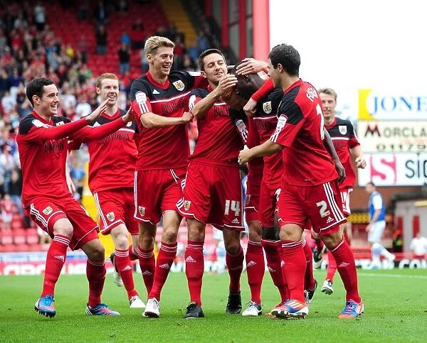 Bristol City Celebrates Championship Win: Albert Adomah and Team Mates Rejoice After Goal Against Blackburn Rovers