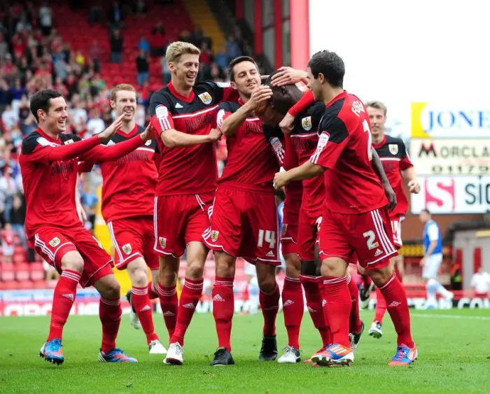 Framed Print : Bristol City Celebrates Championship Win: Albert Adomah and Team Mates Rejoice After Goal Against Blackburn Rovers