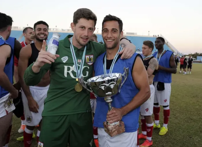 Framed Print : Bristol City Celebrates Friendship Cup Victory: Frank Fielding and Sam Baldock Rejoice with Teammates