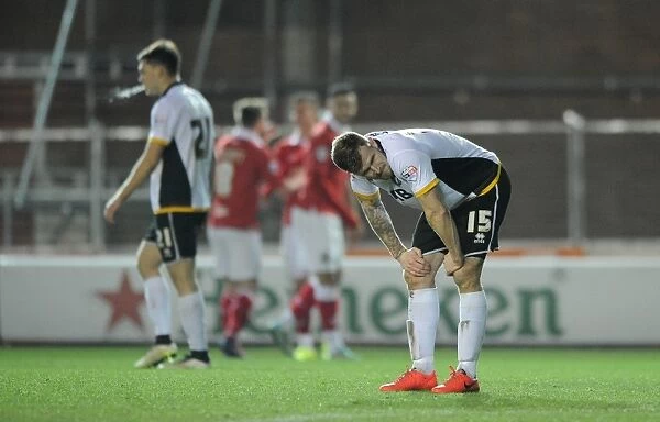 Bristol City Celebrates as Port Vale's Michael O'Connor Looks On Dejected