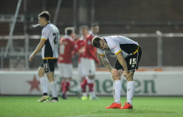 Framed Print : Bristol City Celebrates as Port Vale's Michael O'Connor Looks On Dejected Framed Print : Bristol City Celebrates as Port Vale's Michael O'Connor Looks On Dejected