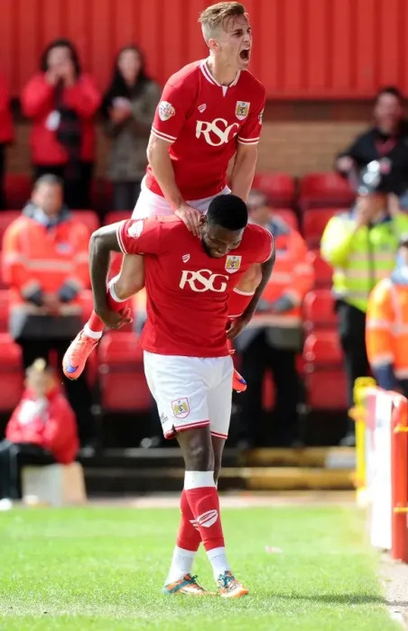 Framed Print : Bristol City Celebrates Win Against Walsall: Jay Emmanuel-Thomas and Joe Bryan Rejoice on Pitch Framed Print : Bristol City Celebrates Win Against Walsall: Jay Emmanuel-Thomas and Joe Bryan Rejoice on Pitch