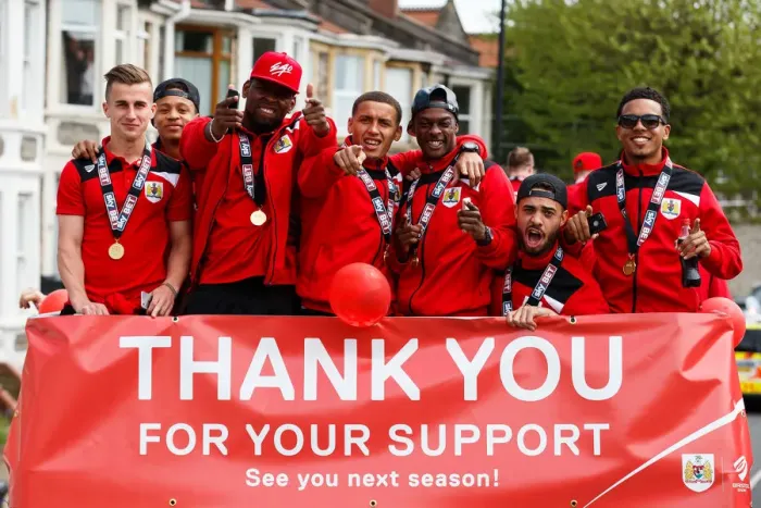Framed Print : Bristol City Champions: Bryan, Reid, Emmanuel-Thomas, Tavernier, Kieran Agard, Derrick Williams, and Korey Smith Celebrate Promotion to Championship on Bus Parade Framed Print : Bristol City Champions: Bryan, Reid, Emmanuel-Thomas, Tavernier, Kieran Agard, Derrick Williams, and Korey Smith Celebrate Promotion to Championship on Bus Parade