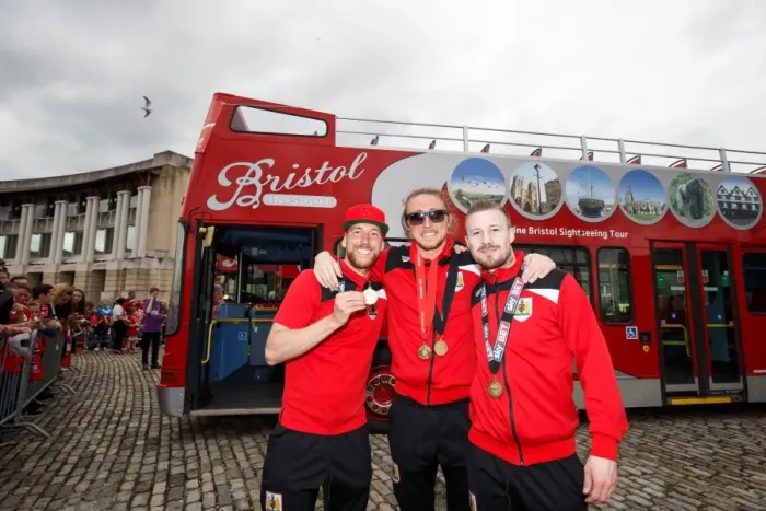 Framed Print : Bristol City Champions: Greg Cunningham, Luke Ayling, and Wade Elliott Celebrate Promotion to Championship on Open Top Bus Parade Framed Print : Bristol City Champions: Greg Cunningham, Luke Ayling, and Wade Elliott Celebrate Promotion to Championship on Open Top Bus Parade