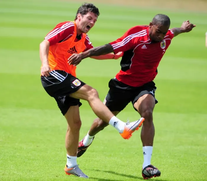 Framed Print : Bristol City: A Clash of Forces - Ivan Sproule vs. Marvin Elliott in Pre-Season Training
