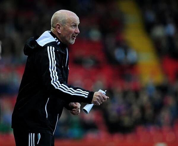 Bristol City Coach Richard Kelly Gives Instructions Ahead of Birmingham City Clash