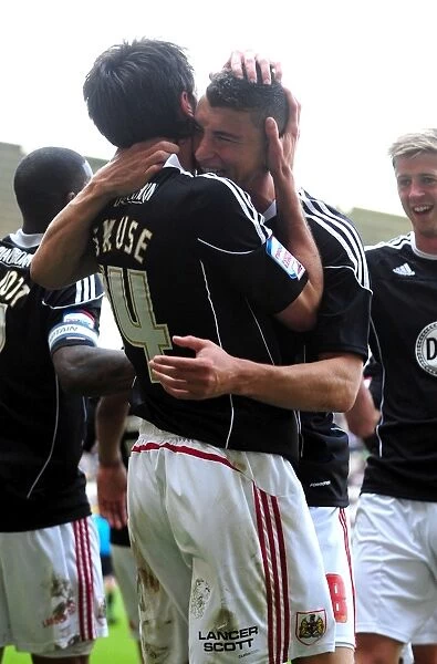 Bristol City: Cole Skuse and James Wilson Celebrate Second Goal Against Derby County in Championship Match, April 2011