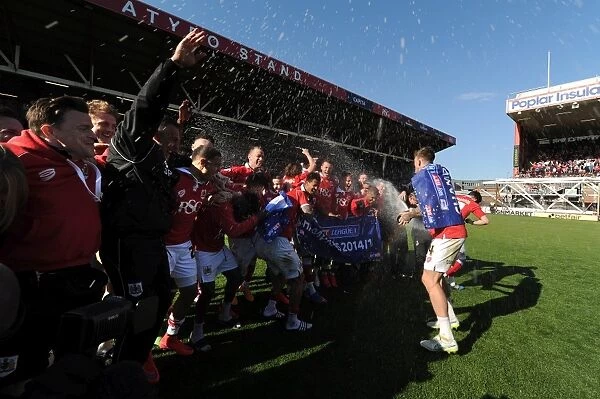 Bristol City Crowned Champions: Aden Flint and Teammates Celebrate with Champagne