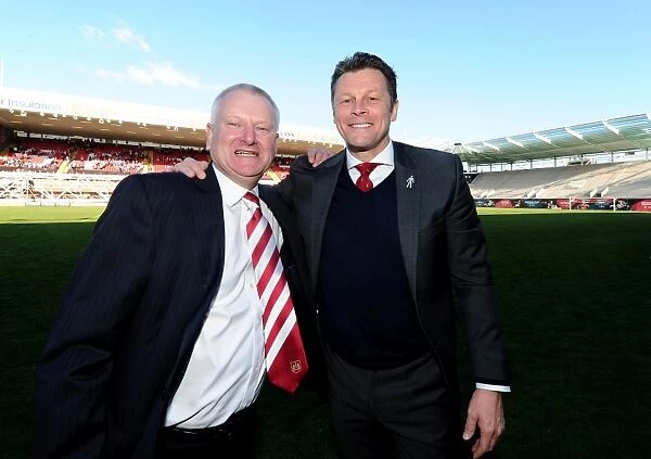 Bristol City Crowned Champions: Steve Lansdown and Steve Cotterill Rejoice in League One Victory