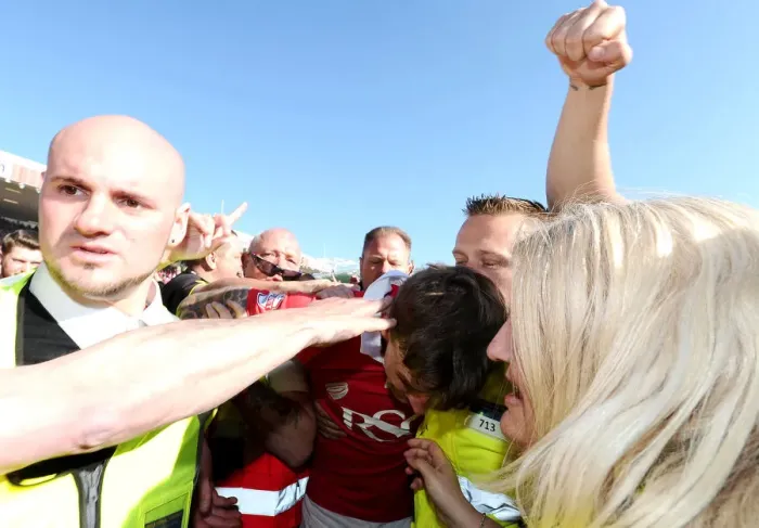 Framed Print : Bristol City Crowned Champions: Thrilling Moment Aden Flint is Surrounded by Jubilant Fans Framed Print : Bristol City Crowned Champions: Thrilling Moment Aden Flint is Surrounded by Jubilant Fans