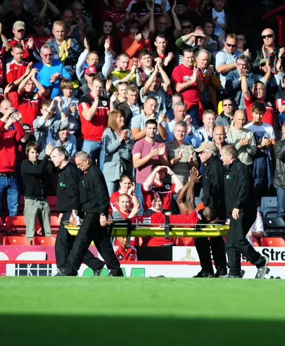 Framed Print : Bristol City Debutant George Elokobi Receives Standing Ovation after Horrific Injury