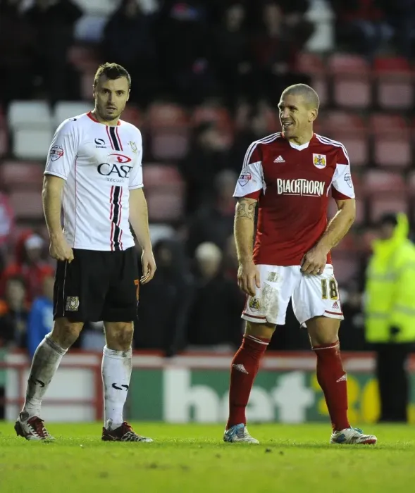 Framed Print : Bristol City: El-Abd and Carruthers Share a Laugh Amidst League One Rivalry Framed Print : Bristol City: El-Abd and Carruthers Share a Laugh Amidst League One Rivalry