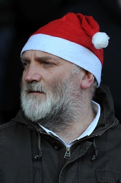 Bristol City Fan in Christmas Hat Celebrates at Ashton Gate during Bristol City vs Crawley Town Match, Sky Bet League One