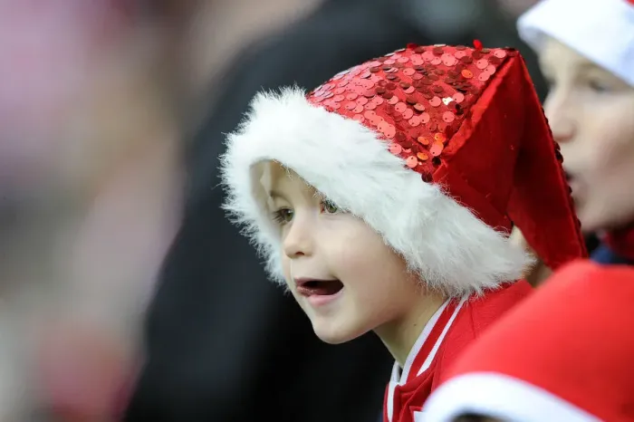 Framed Print : Bristol City Fan in Christmas Hat Celebrating at Ashton Gate during Sky Bet Championship Match against QPR, 2015