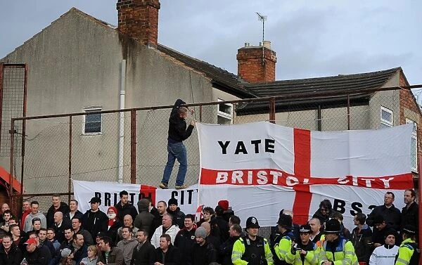 Bristol City Fan Hoists Flag at Tamworth's The Lamb Ground during FA Cup Match