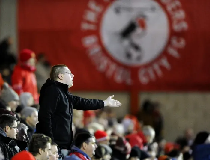 Framed Print : Bristol City Fan Pleads with MK Dons David Martin During Match at Ashton Gate Framed Print : Bristol City Fan Pleads with MK Dons David Martin During Match at Ashton Gate