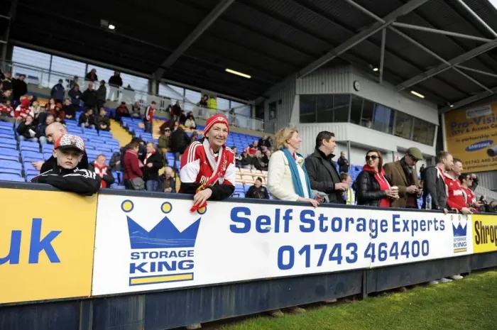 Framed Print : Bristol City Fans in Action at Shrewsbury Town's New Meadow, March 2014 Framed Print : Bristol City Fans in Action at Shrewsbury Town's New Meadow, March 2014