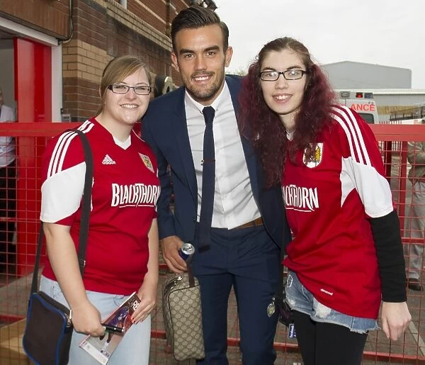 Bristol City Fans Celebrate with Marlon Pack after Victory over MK Dons, September 2014