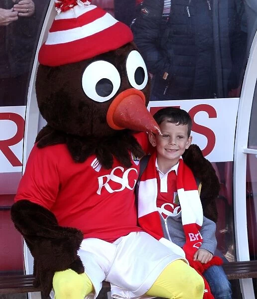 Bristol City Fans Celebrate with Robin Mascot after Win against Coventry City, 18th April 2015